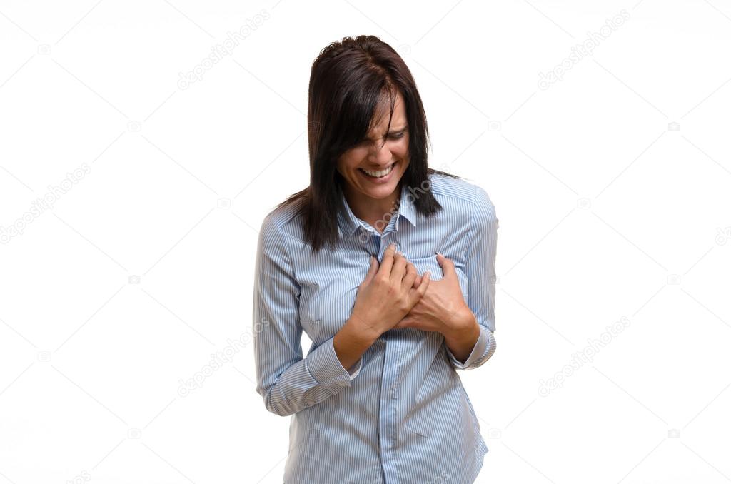 Young woman suffering angina or a heart attack