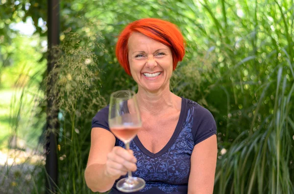 Attractive happy woman toasting with champagne — Stock Photo, Image