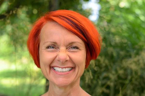Vivacious middle-aged redhead woman — Stock Photo, Image