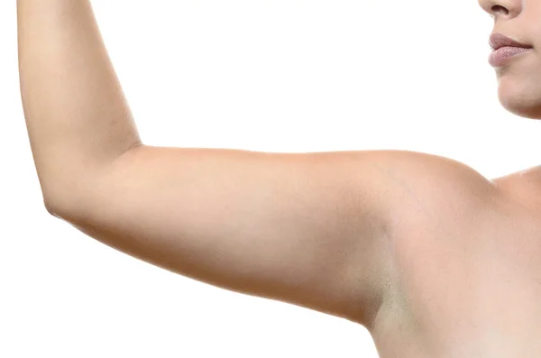 Acercamiento en una axila femenina y la parte superior del brazo — Foto de Stock