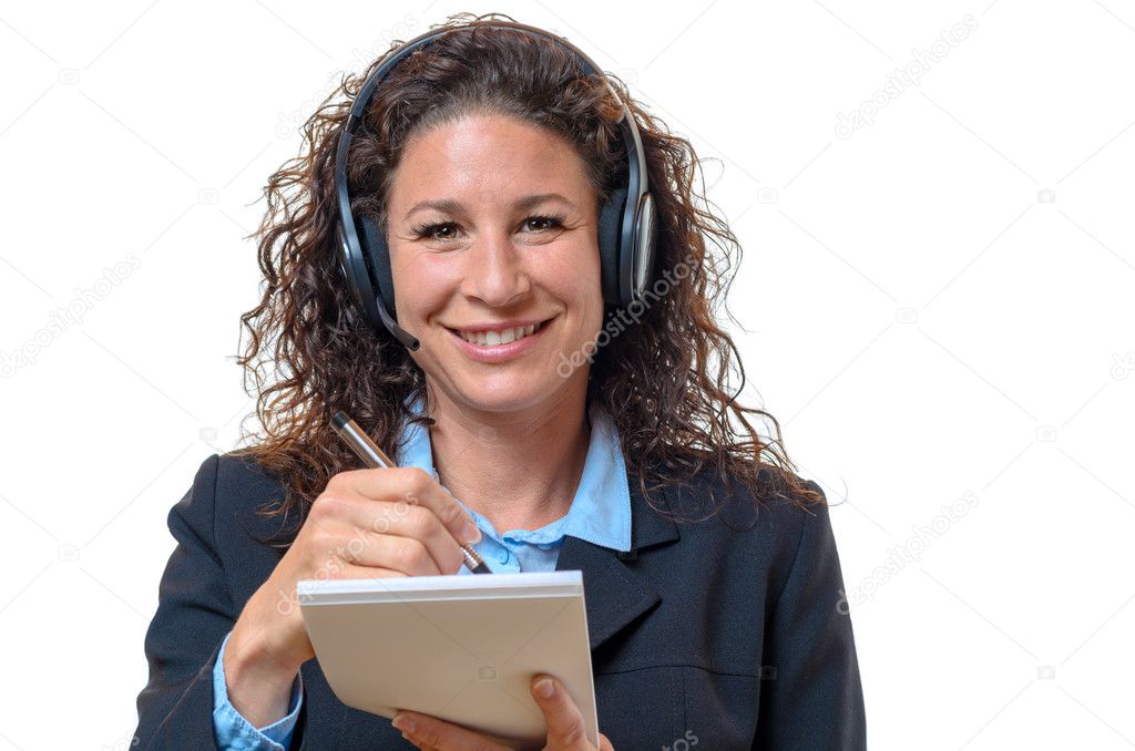 Smiling friendly businesswoman in a headset