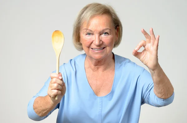 Senior cook showing her approval — Stock Photo, Image