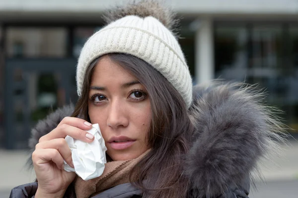 Sad tearful woman holding a handkerchief — Stock Photo, Image