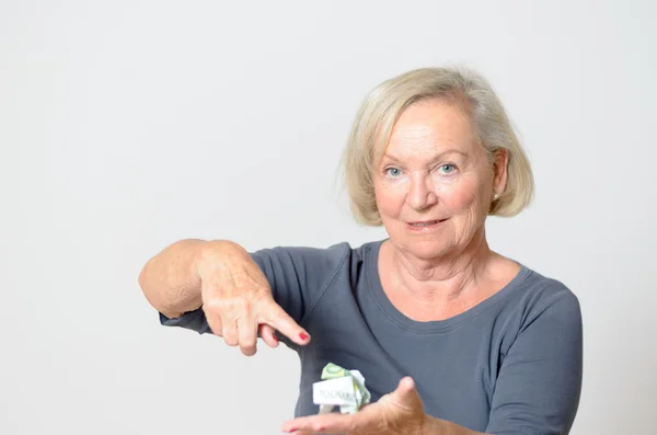 Senior Woman Showing Crumpled Money on Hand — Stock Photo, Image