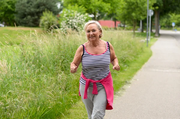 Healthy Middle Aged Woman Jogging at the Street — Stock Photo, Image