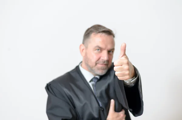 Empresário dando um gesto polegar para cima — Fotografia de Stock