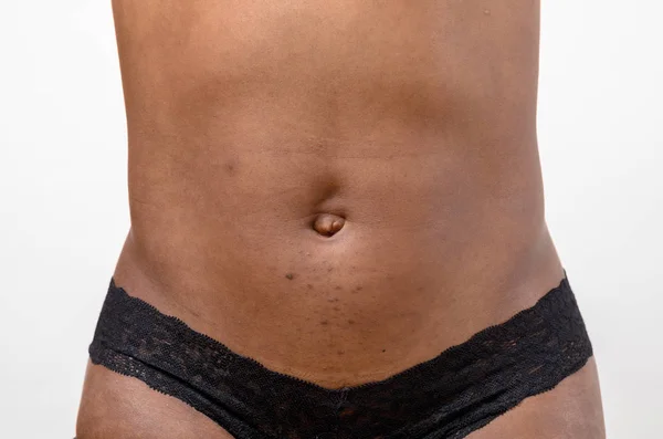 スリムな引き締まった若い女性の腹部 — ストック写真