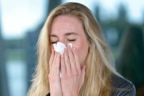 Young blond woman with hay fever — Stock Photo, Image