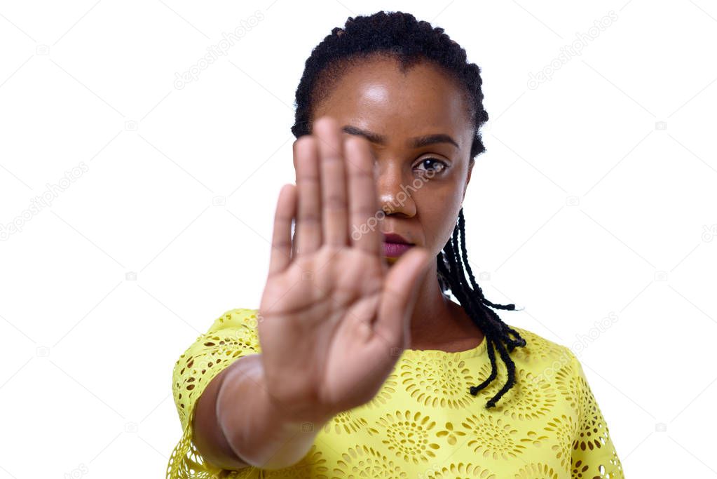 African American woman showing hand stop gesture
