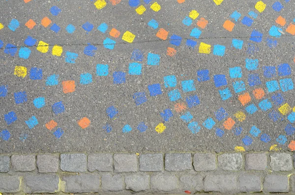 Colorful pattern of painted squares on a street — Stock Photo, Image
