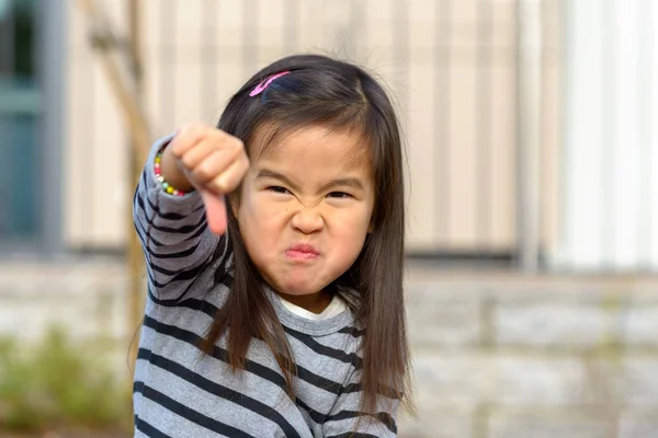 Angry frustrated girl throwing a temper tantrum — Stock Photo, Image