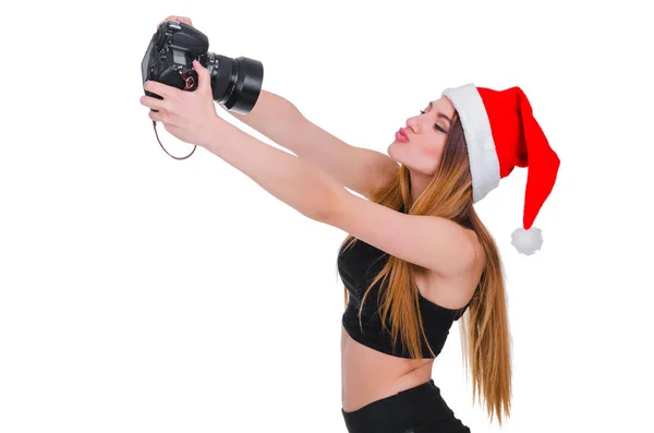 圣诞老人带着照相机戴帽子的女孩。年轻女孩摄影师圣诞节。圣诞节自拍照. — 图库照片