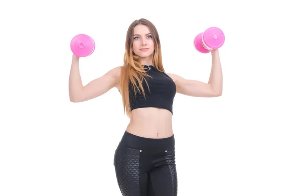 Diyet. Fitness. Genç güzel kız onun elinde pembe dumbbells ile. Kız spor egzersiz gerçekleştirir — Stok fotoğraf