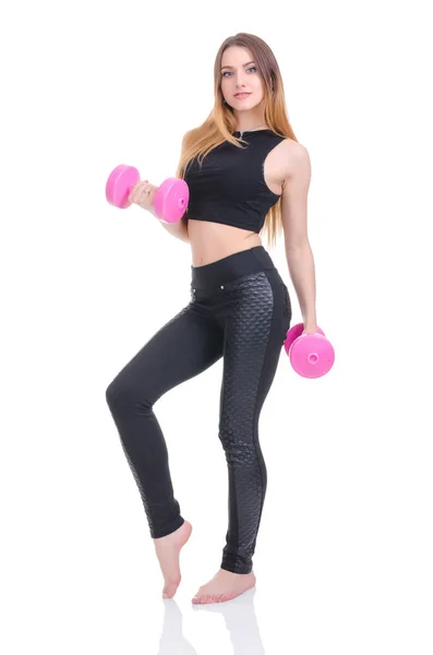 Ernährung. Fitness. junges schönes Mädchen mit rosa Hanteln in seinen Händen. Mädchen turnt Sport — Stockfoto