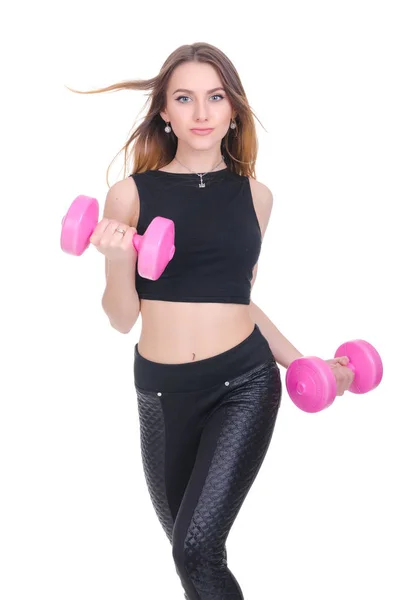 Ernährung. Fitness. junges schönes Mädchen mit rosa Hanteln in seinen Händen. Mädchen turnt Sport — Stockfoto