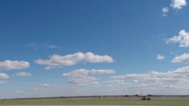 Time lapse clip of white clouds over — Stockvideo