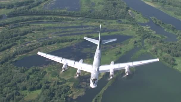 Russian bomber Tu-95 in the background of the river — Stock Video