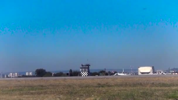 Biplane flying at low altitude — Stock Video