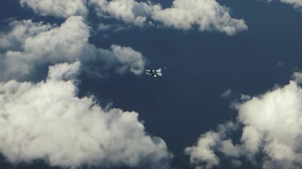 A fighter flies over a cloud — Stock Video