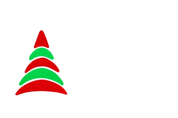 Την Πρωτοχρονιά και τα Χριστούγεννα εννοιολογική δέντρο φτιαγμένο από ένα χρώμα χαρτόνι. Απομονωμένη. — Φωτογραφία Αρχείου