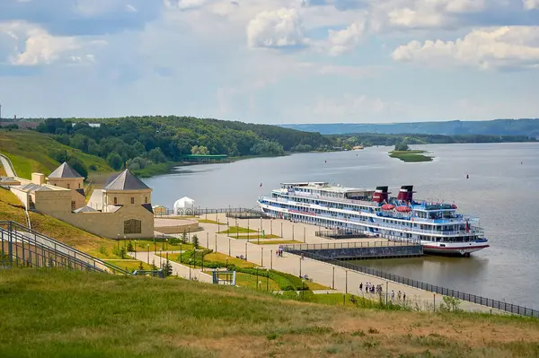 A passenger ship with tourists is moored on the Volga river near the city of Bulgar. Passenger ship at the pier.