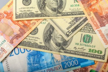 Nakit para geçmişi. Amerikan ve Rus para banknotlarının geçmişi. Dolar ve ruble arkaplanı.