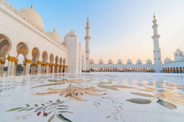 Panoramic view of Sheikh Zayed Grand Mosque, Abu Dhabi, United Arab Emirates. The third biggest mosque in the world. Blue sky sunny day. clipart