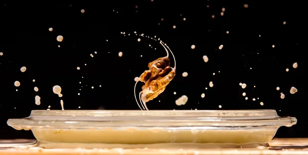 Hazelnut in milk splash