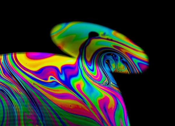 Regnbågsfärger skapade av tvål, bubbla eller olja — Stockfoto