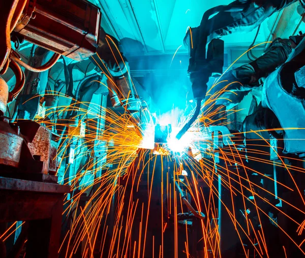 Lassen van robots beweging in een autofabriek — Stockfoto
