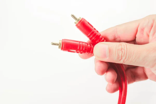 Ręki Człowiek Trzymając Kabel Audio Rca Białym Tle — Zdjęcie stockowe