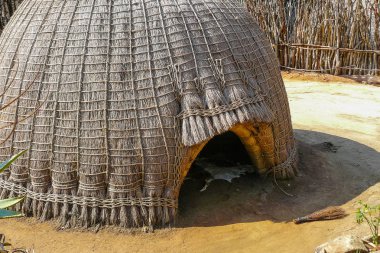 Swazi tribe hut in Swaziland entrance close up clipart