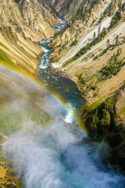 Yellowstone waterfall with rainbow at inspiration point — Stock Photo, Image