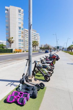 Chile La Serena scooter wheels and electric bike for rent clipart