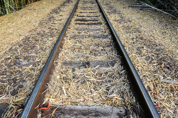 Old train track made of steel, wood and stones. — Stock Photo, Image