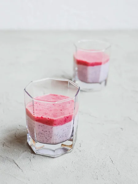 Chia pudding with mashed berries and banana, Healthy eating concept. Super food.