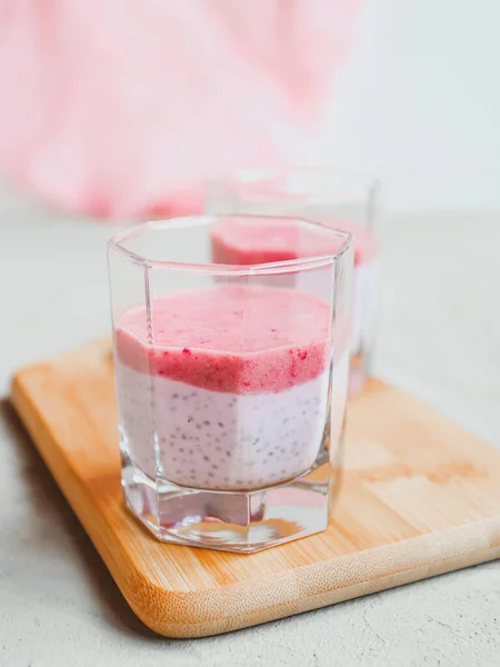 Chia pudding with mashed berries and banana, Healthy eating concept. Super food.