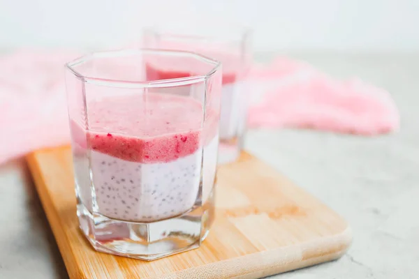 Chia pudding with mashed berries and banana, Healthy eating concept. Super food.