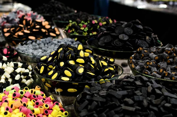 Liquirice candies on a market stall — Stock Photo, Image