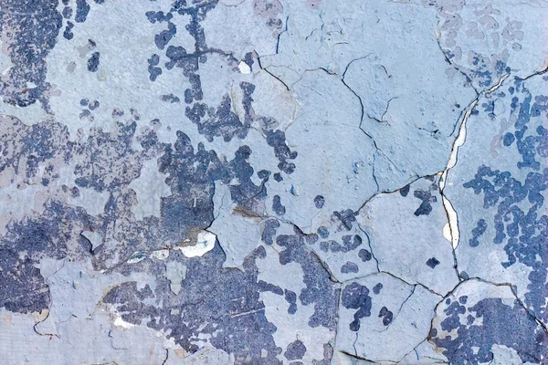 Grungy or vintage cracked blue painted stone or cement old texture as a abstract pattern wall. Conceptual banner