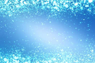 Noel soyut bokeh parlak ışıklar mavi zemin üzerine. Yuvarlak ufuk daire parçacıklar