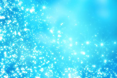 Noel soyut bokeh parlak ışıklar mavi zemin üzerine. Yuvarlak ufuk daire parçacıklar