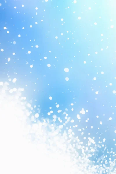 Fondo abstracto de Navidad. Nieve en el cielo azul —  Fotos de Stock