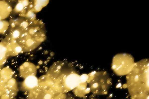 Різдвяний фон. Золотий боке на чорному — стокове фото