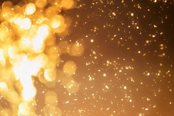 Gold magic sparkles. Christmas background