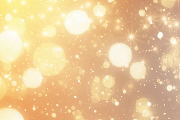 Fundo de Natal dourado. Luzes de brilho ou bokeh — Fotografia de Stock