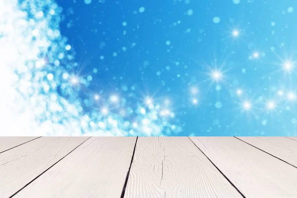 Vitt bord och jul festliga blå bakgrund med glitter eller bokeh — Stockfoto