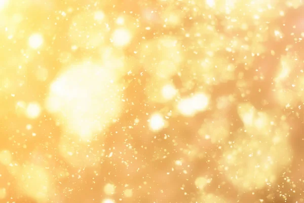 Golden bokeh or glitter lights festive background — Stock Photo, Image