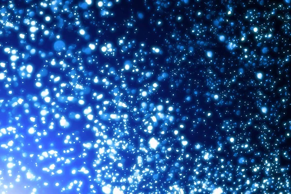 Blauwe Kerstmis achtergrond. Sneeuw of bokeh deeltjes — Stockfoto