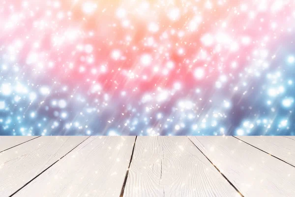 Boże Narodzenie streszczenie niebieskim tle z golden okrągłe bokeh lub koło światła świecidełka i biały stół. Używać do wyświetlania lub montaż produktów — Zdjęcie stockowe